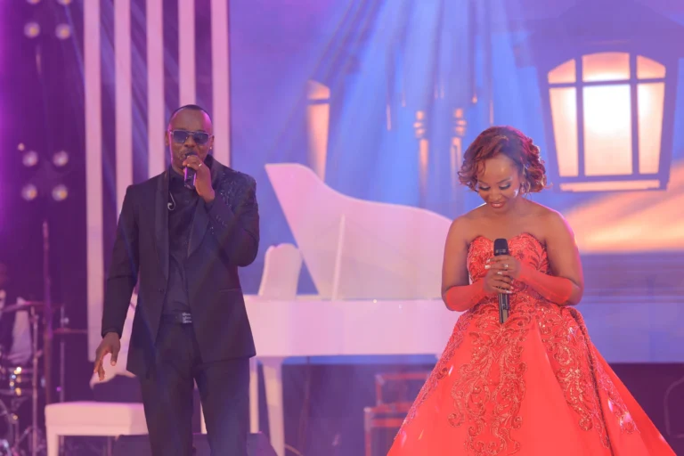 couple-duet-stage-red-gown-linc-and-veve