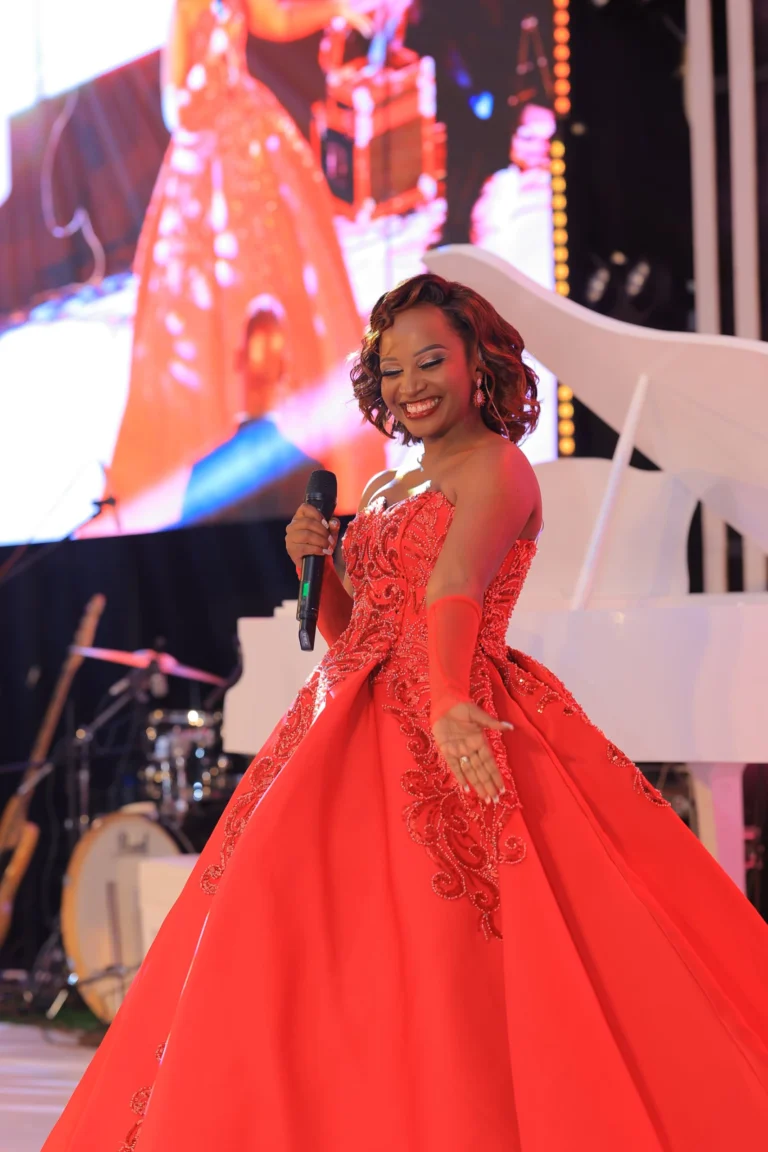 veve-solo-stage-red-gown-piano-2-linc-and-veve